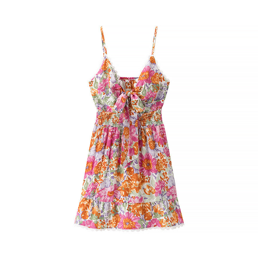 Robe femme mini – Coupe évasée – Bretelles fines – Nœud dos – Imprimé fleuri