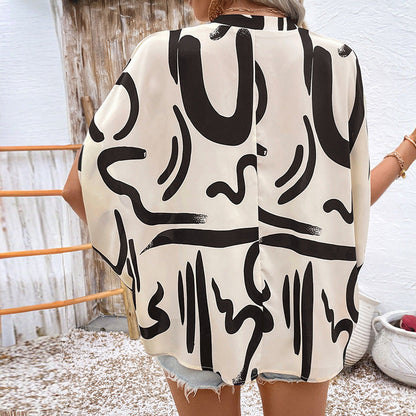 Blouse femme – Coupe ample – Manches chauve-souris – Décolleté en V – Imprimé géométrique